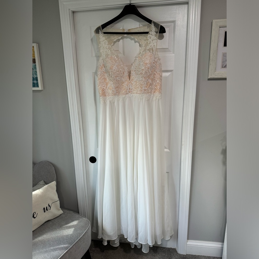 I purchased this one online it was my backup dress!  I didn’t use or alter it